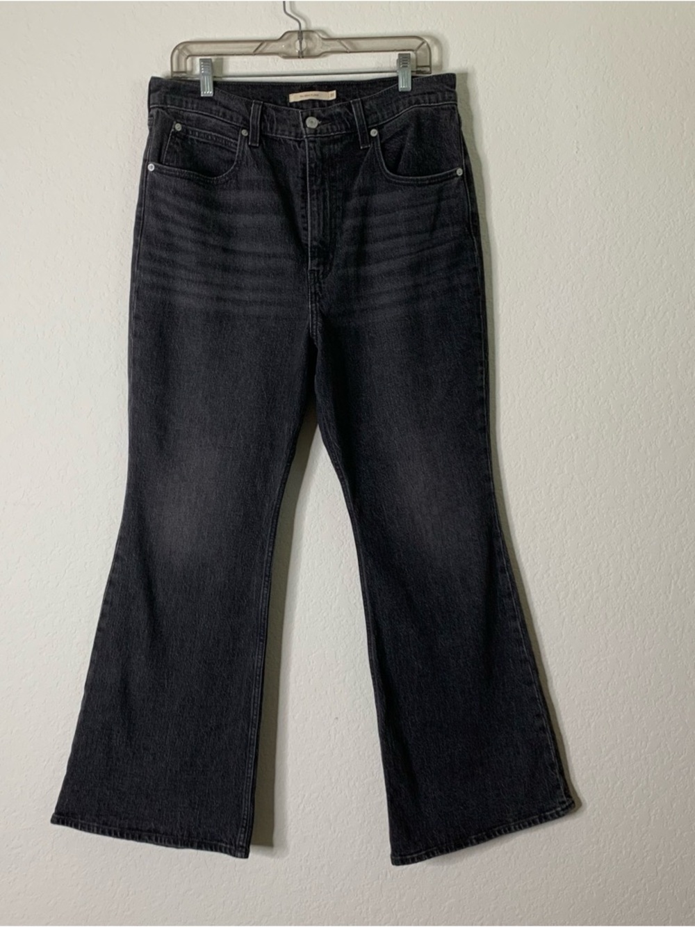 Levi’s womens black 70s high rise flare jeans 31